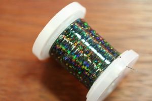 Holographic Tinsel Medium Black