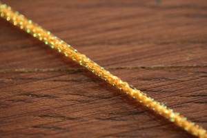 Hareline Micro Pearl Core Braid Orange